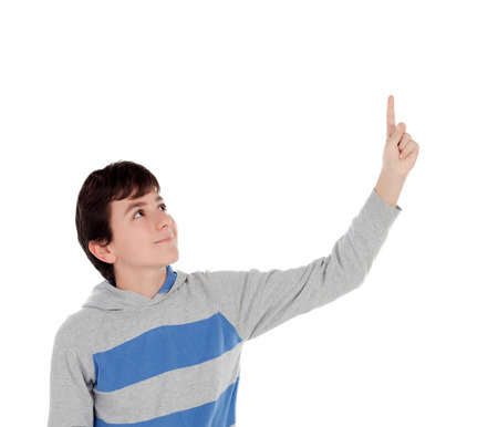 Casual young teenager pointing with his finger isolated on a white backgroundの写真素材