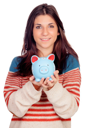 Casual girl with a blue money box isolated on a white backgroundの写真素材
