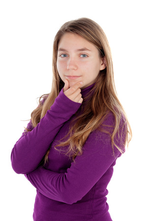 Pensive teenager girl isolated on a white backgroundの写真素材