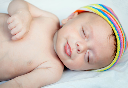 Beautiful baby sleeping the nap in the crib