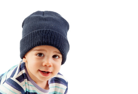 Adorable baby with wool cap isolated on a white backgroundの写真素材
