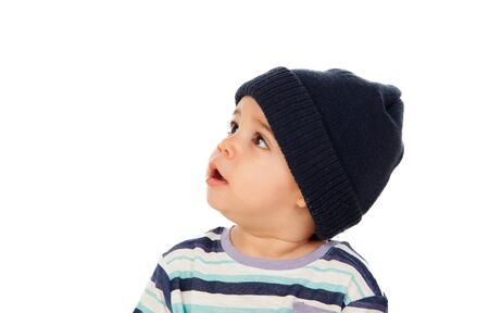 Adorable baby with wool cap isolated on a white backgroundの写真素材