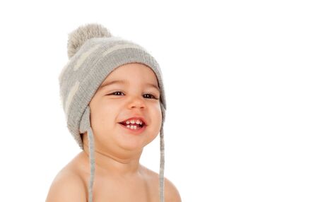 Adorable baby with wool cap isolated on a white backgroundの写真素材