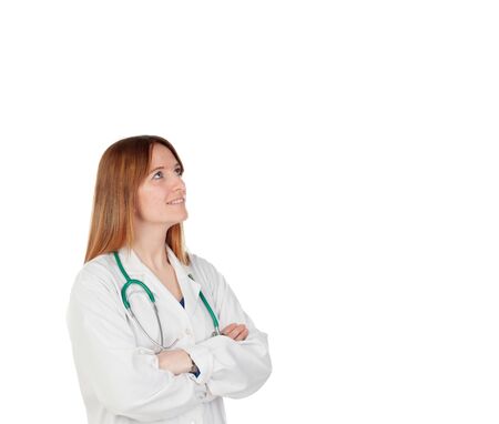 Blond doctor woman thinking isolated on a white backgroundの写真素材