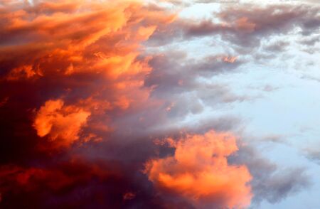 Beautiful orange sky like a painting with sunny clouds