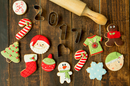 Delicious Christmas cookies on a wooden tableの写真素材