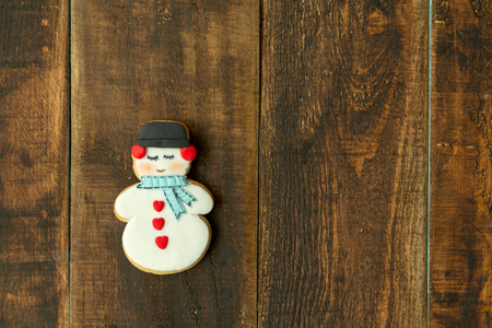 Delicious Christmas cookies on a wooden tableの写真素材