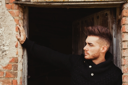Attractive guy in a old house. Photos for adsの写真素材