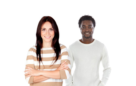 Brunette woman in close-up and handsome African man in the background isolatedの写真素材