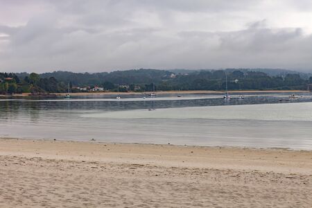 Beautiful cloudy day in a beach in the Northwest of Spainの写真素材