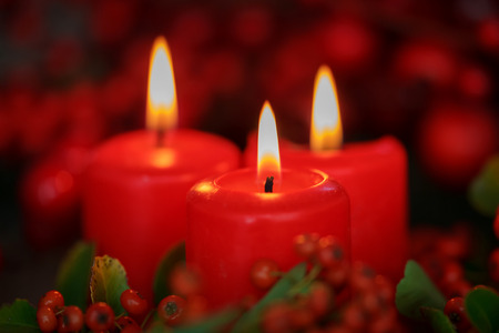 Christmas candles in red. Decoration for holidaysの写真素材