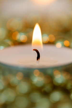 Christmas candles with golden decoration. Warm holidaysの写真素材