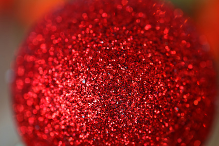 Red Christmas balls with glitter. Tree decorationsの写真素材