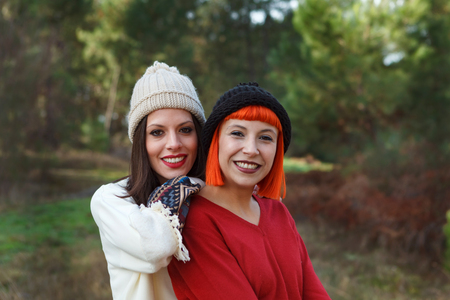 Beautiful friends in the forest in a winter dayの写真素材