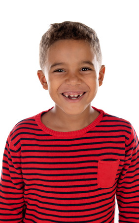 Beautiful latin child with red striped shirt isolated on a white backgroundの写真素材