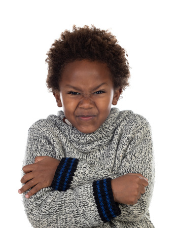 Angry african child with wool jersey isolated on a white backgroundの写真素材