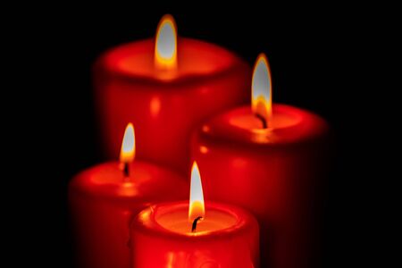 Christmas candles in red. Decoration for holidaysの写真素材