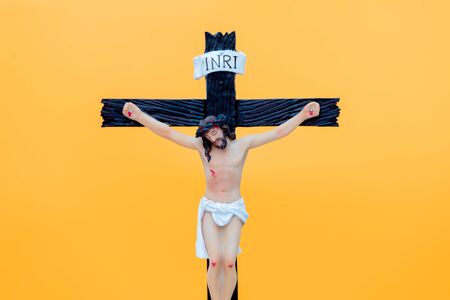 Cross Jesus Christ. Plaster figure close upの写真素材