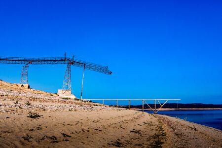 Big crane in the countryside with a blue sky of backgroundの写真素材