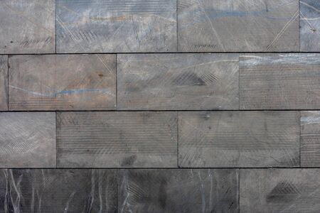 Interior modern wall with grey ceramic plateletsの写真素材