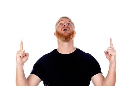 Red haired man with long beard looking up isolated on a white backgroundの写真素材