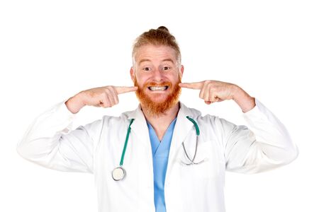 Funny redhead doctor isolated on a white backgroundの写真素材