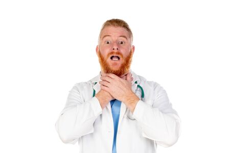 Funny redhead doctor isolated on a white backgroundの写真素材