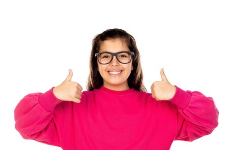 Adorable preteen girl with pink jersey isolated on a white backgroundの写真素材
