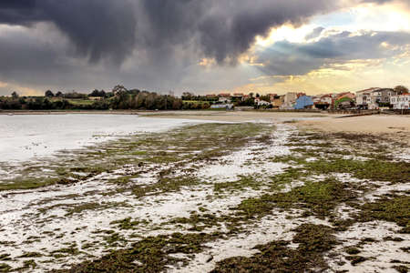 Nice seaside Spanish town during the low tide