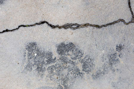 Crack on cement floor. Damaged wallの写真素材