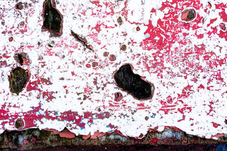 Surface covered with red paint. Authentic texture