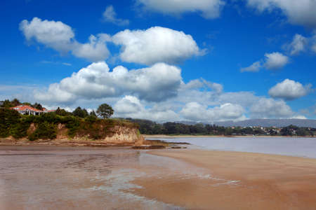 Nice landscape of a lonely beach with a stunning sky in the backgroundの写真素材