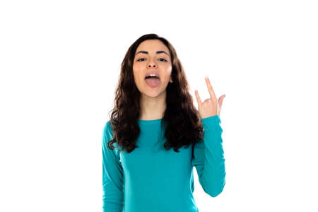 Adorable teenage girl with blue sweater isolated on a white backgroundの写真素材