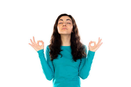 Adorable teenage girl with blue sweater isolated on a white backgroundの写真素材