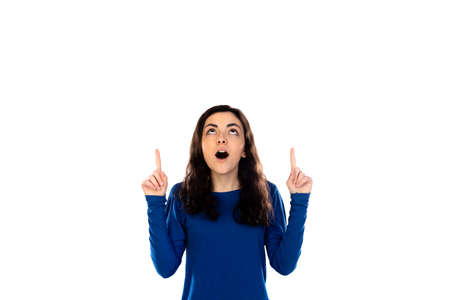 Adorable teenage girl with blue sweater isolated on a white backgroundの写真素材