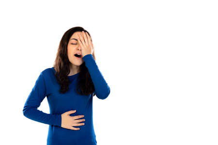 Adorable teenage girl with blue sweater isolated on a white backgroundの写真素材