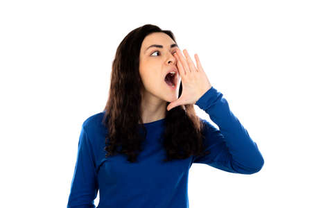 Adorable teenage girl with blue sweater isolated on a white background