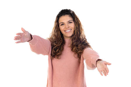 Beautiful middle aged woman with pink woolen sweater isolated on a white backgroundの写真素材