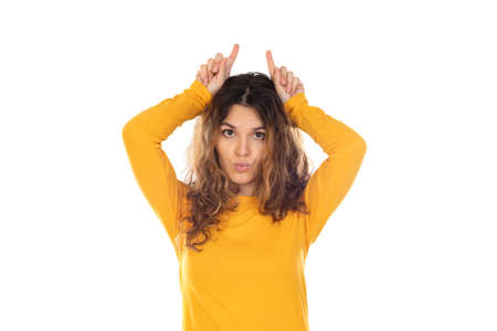 Beautiful woman with wavy hair isolated on a white background