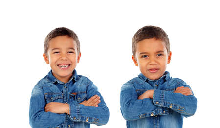 Twin brothers with different expressions isolated on a white backgroudn