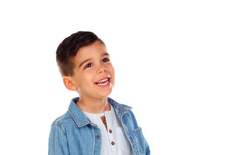 Adorable child with dark hair isolated on a white backgroudn