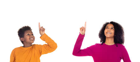 Young children indicating something with the finger isolated on a white background