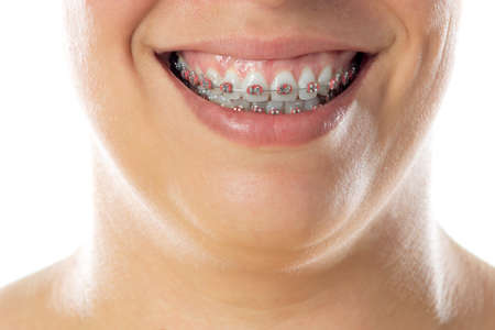 Close-up portrait of cheerful woman isolated on a white background