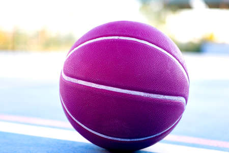 Purple basketball closeup on the playgroundの写真素材