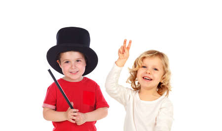 Cute little magician and a winner friend isolated on a white backgroundの写真素材
