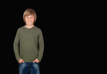 Full length portrait of a boy in khaki t-shirt isolated on a color background