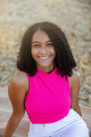 Beautiful woman smiling and enjoying a free day in park