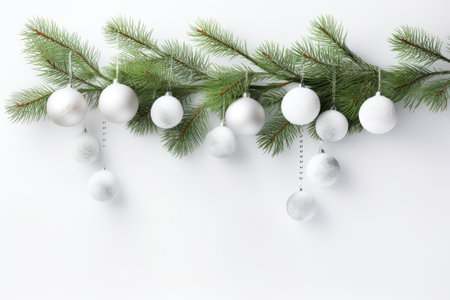 Christmas card with a snowy branch with decoration on a white background. Generative AIの素材