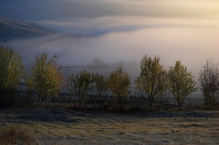 Autumn morning misty hillsの写真素材