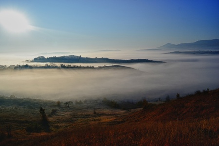 Autumn morning misty hills